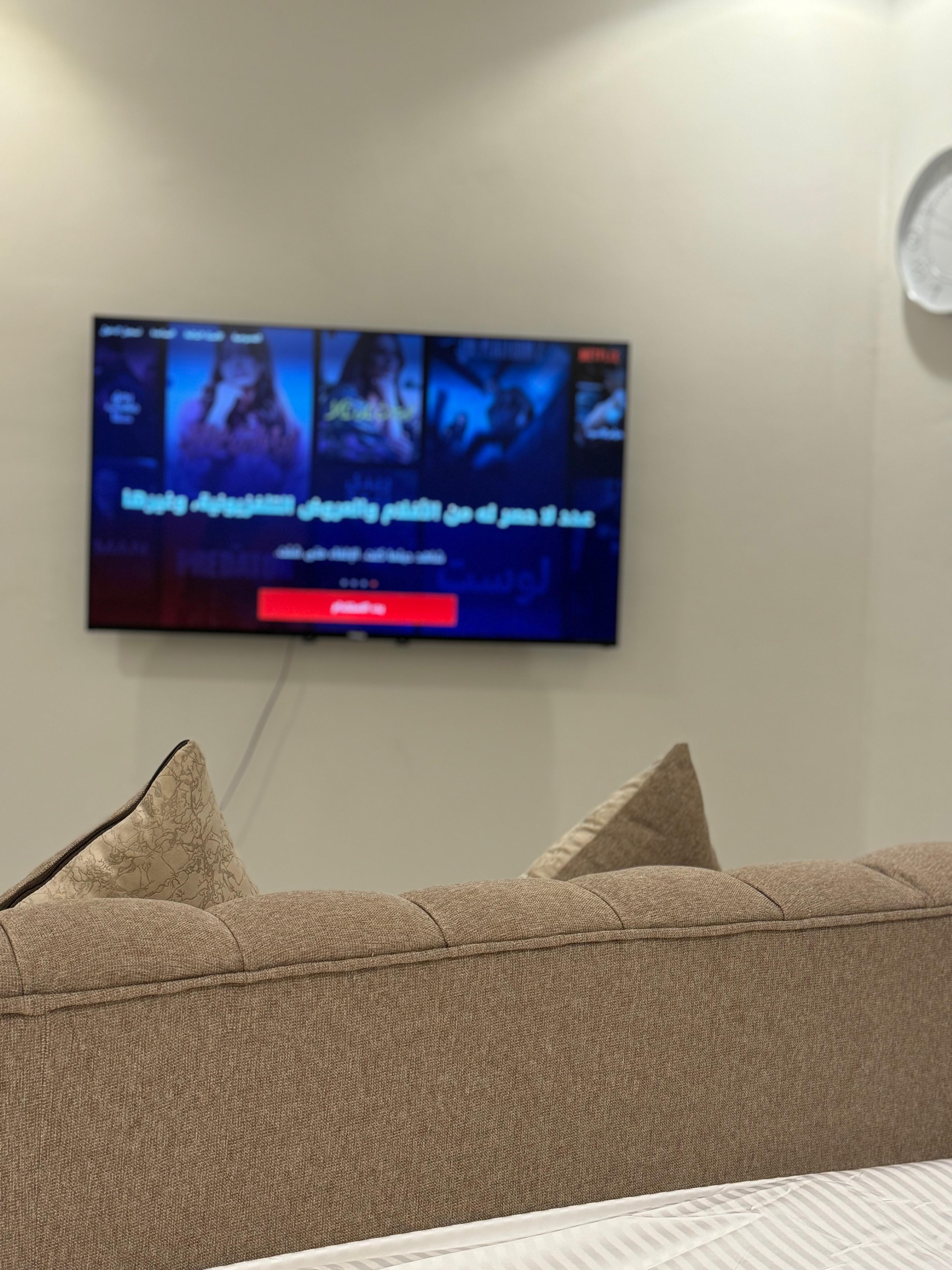 Studio with master bed and comfortable seating in Al Yasmeen 101