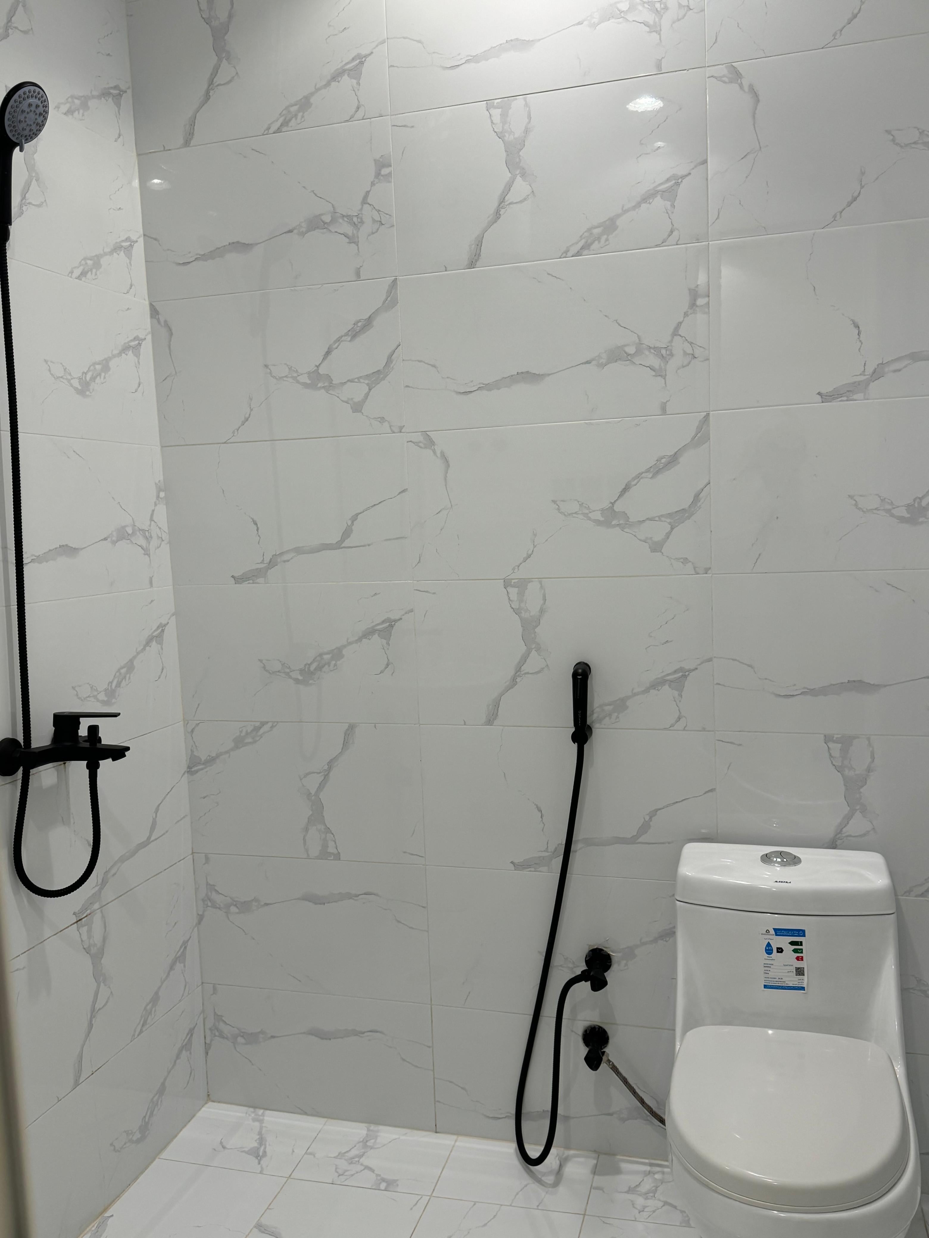 Studio with master bed and comfortable seating in Al Yasmeen 101