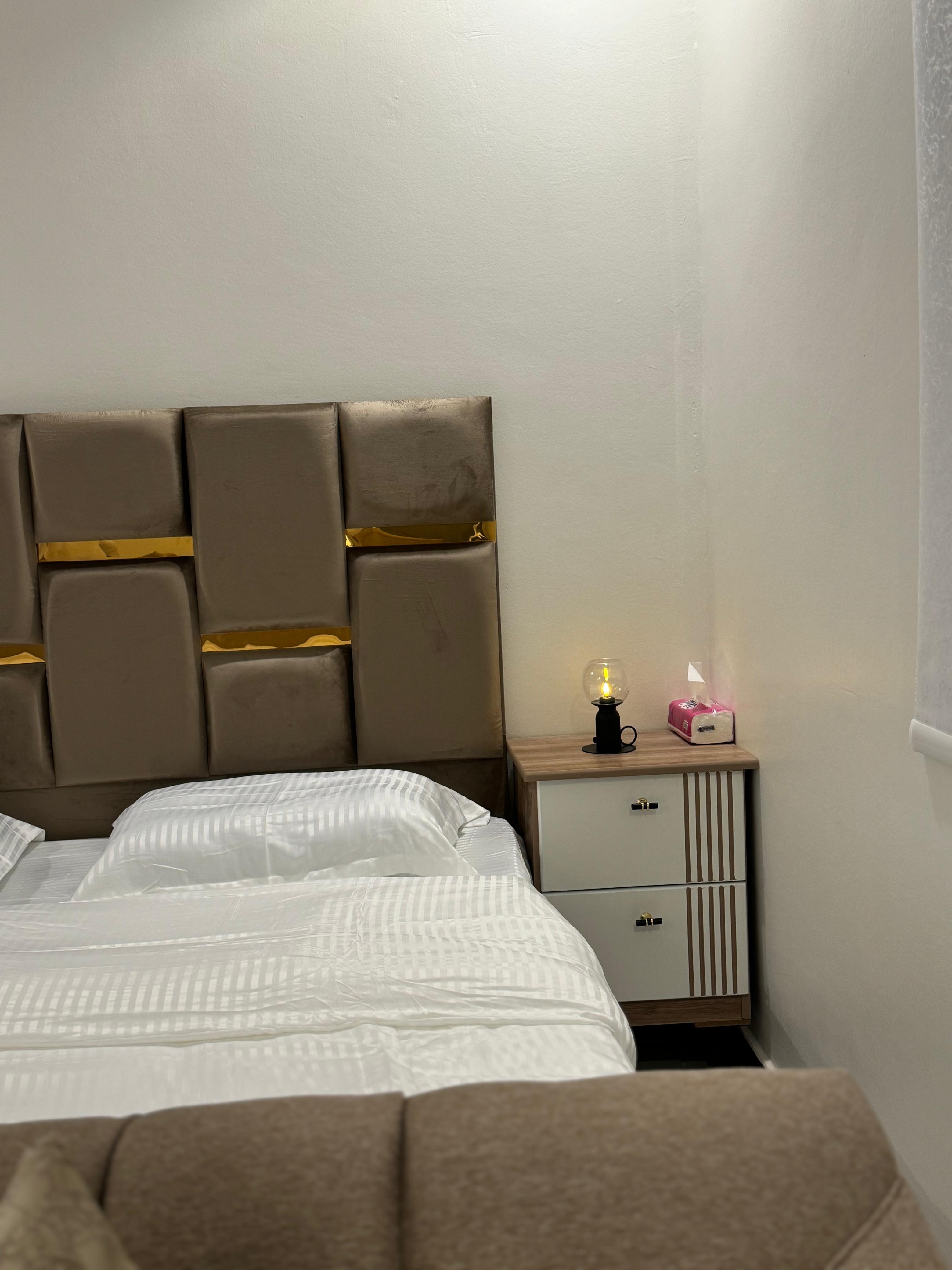 Studio with master bed and comfortable seating in Al Yasmeen 101