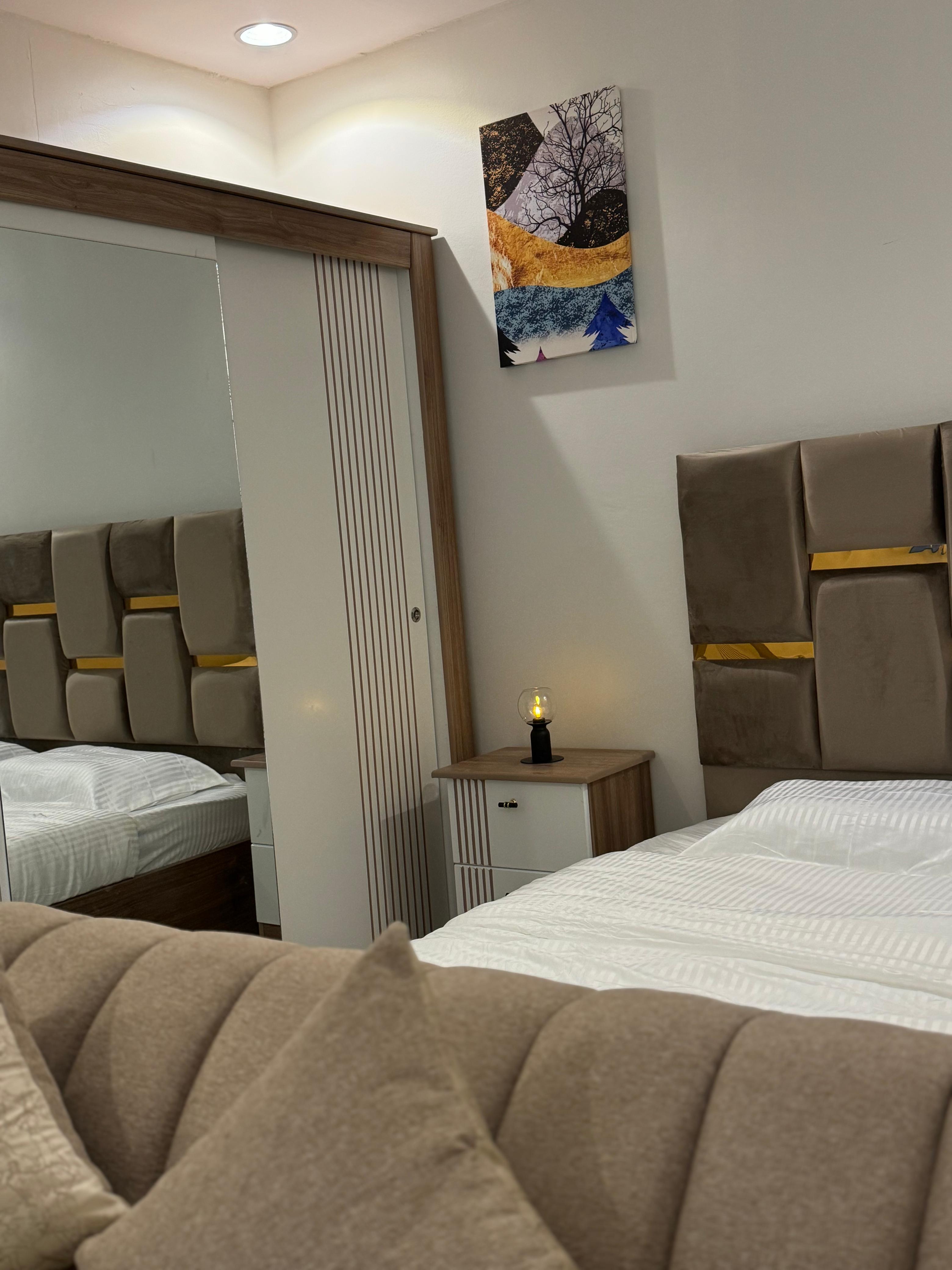 Studio with master bed and comfortable seating in Al Yasmeen 101