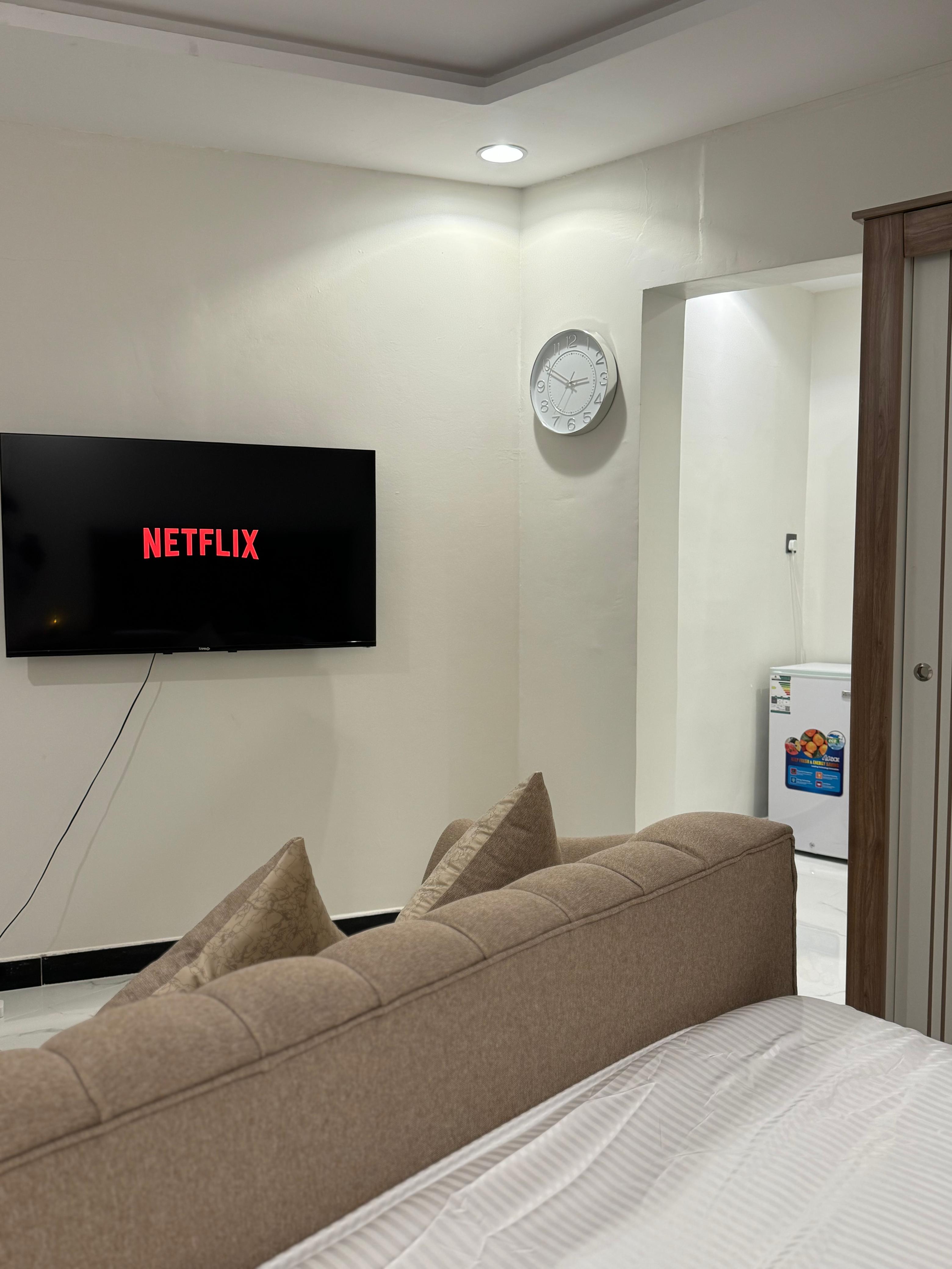 Studio with master bed and comfortable seating in Al Yasmeen 101